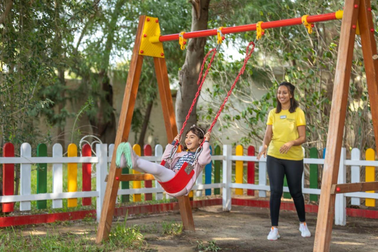 Steigenberger Marhaba Thalasso Hammamet Esterno foto A child on a swing